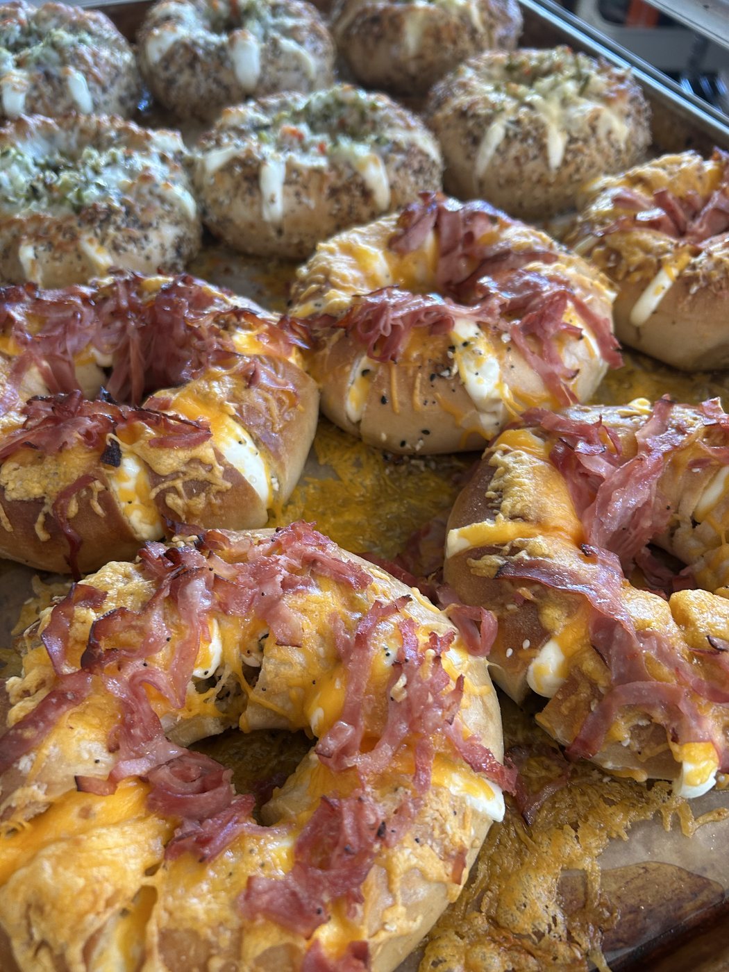 Savory stuffed bagels with ham and melted cheese
